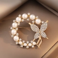 Elegant gold butterfly brooch with crystal pavé and circular pearl embellishments - Gold Butterfly Pearl Ring