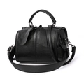 Chic black soft leather Boston handbag with wide strap and tassel zipper detail - Black