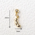 Macro shot of gold peanut heart pendant with dimensions 20mm height and 3mm width - Gold Peanut Pendant