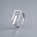 Detailed close-up showing S925 hallmark on minimalist silver hollow letter E ring - Silver