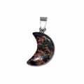 Macro shot of crescent moon pendant with reddish-brown natural stone texture and silver bail - Mahogany Obsidian