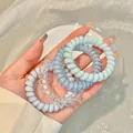 Set of four blue and purple spiral hair ties in high elasticity resin material - 13# Blue Clear (4pcs Bag)