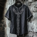 Close-up of V-neck shirt with detailed crow and Celtic knot embroidery on gray fabric - S / Dark Grey (Raven Embroidery)