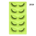 Detail view of 5 pairs of black fox-eye cat-eye false eyelashes in a green tray, style ZF29 - Natural Slim Style (ZF29)