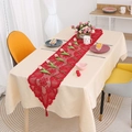 Red lace Christmas table runner with floral patterns and tassels on a beige cloth - Lily Red