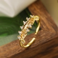 Exquisite gold-plated geometric open ring with zircon accents on a wooden display - Adjustable Open / 14225/Gold/White Pavé Zircon