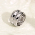Macro shot of silver dual-layer titanium steel ring with polished mirror finish - Size 6 / Steel