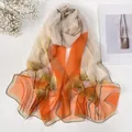 Lightweight long scarf featuring orange and white gradient with ginkgo leaf prints - Ginkgo Leaf Orange