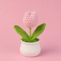 Close-up of handmade crochet pink tulip in a white ceramic pot with green leaves - Pink Single Head Tulip