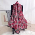 Detail of a red paisley silk scarf draped on a chair showing texture and pattern - 180*90CM / Red