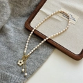 Baroque freshwater pearl necklace featuring a golden toggle clasp and white flower pendant - Style Q-280-Freshwater Pearl Flower Pendant Necklace