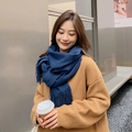 Elegant solid blue cashmere scarf with fringes worn by a woman for winter warmth - 300g Wool Blend Style / Navy Blue