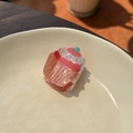 Detail of pink acrylic cupcake hair claw with glitter accents on white ceramic plate - Pink - Cupcake Cream Cake Small Claw