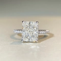 Macro shot of 4-carat radiant cut gemstone ring with pavé-set silver band detail - Off-White Zirconia