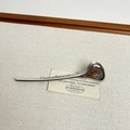 Macro detail of the smooth silver streamline metal brooch with a polished finish - 20 Silver Leaf (S-92)