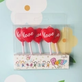 Red heart-shaped birthday candles with white love text in 5-piece pack for party - Red Heart Love Candle