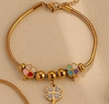 Detailed close-up of golden snake chain bracelet featuring multi-color clover charms and beads - S078 Gold Rhinestone Clover Bracelet