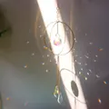 Star and moon suncatcher with golden rings and multifaceted crystal prisms - Size 17