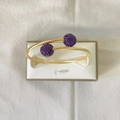 Bracelet torsadé en or 18k avec boules d'extrémité ornées de strass violets fins - Or/Violet