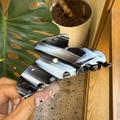 Macro shot of large black and white marble pattern acetate claw clip with glossy finish - Large / Black & White Wide Stripes