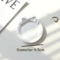 White matte plaster jewelry tray with 3D bow decoration, 9.5cm diameter display plate - White Round Bow Tray