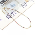 Detail shot of colorful mini crystal beads necklace with a gold heart pendant charm - Mixed Colors