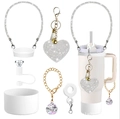 Close-up of silicone water bottle accessories set with sparkling rhinestones and heart charm - White Diamond Luxury Set