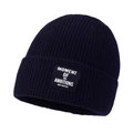 Winter dark blue knit beanie with a stylish text patch on a soft ribbed wool surface - Navy Blue