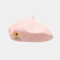 Detail showing the intricate yellow sunflower embroidery on a pink wool beret hat - One Size / Pink