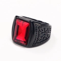 Detail of a black stainless steel ring featuring a large rectangular red gemstone inlay - Black Base Red Gemstone