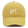 Detail of APT embroidery on washed ginger cotton baseball cap with vintage finish - Yellow