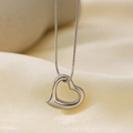 Polished silver hollow heart pendant necklace with fine snake chain on silk fabric - Zxgn0192ys