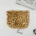 Detail of soft faux fur makeup bag with giraffe pattern and premium zipper closure - Makeup Bag / Yellow Small Leopard