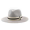 Detail of grey woven Panama hat with black and beige striped elastic band accent - Gray