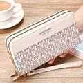 Detail of cream long double zipper wallet with monogram pattern and wrist strap - Off-White With Taupe WK Monogram