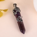 Deep purple amethyst hexagonal point pendant with silver rose vine wrap on pink background - Amethyst