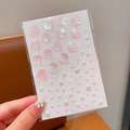 Autocollants visage coquillage rose holographique et perles blanches pour maquillage scène - Coquillage de perle