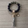 Silicone bead keychain bracelet featuring leopard print tassel and wooden bead - Leopard Series