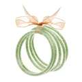 Dettaglio di cinque braccialetti glitter verdi con un fiocco in organza arancio rosa - Paillettes giallo verde erba con set di fiocchi (30150)