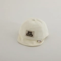 Detail of baby soft brim cotton baseball cap featuring embroidered Mickey silhouette patch - 48-50cm 1-2 Years / White