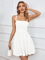 Close-up of adjustable bow shoulder straps and layered tiers on white summer dress - Off White