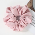 Close-up of soft pink satin oversized scrunchie with elegant pleated texture and silky shine - Pale Pink(E)