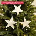 Set of 3 white glittery star Christmas ornaments hanging on a festive pine tree - Five-pointed Star