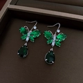 Detailed view of silver butterfly earrings with emerald green teardrop zircon in a box - Butterfly Water Drop Necklace Ear Hook Set / Green