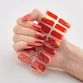 3D self-adhesive nail stickers in red with gold foil accents, model DQ-48 on model hands - DQ-48 Red Gold Foil