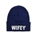 Close-up of navy blue knit beanie featuring white fuzzy WIFEY letter embroidery details - One Size / Navy Blue