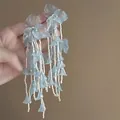Detail of light blue floral tassel earrings with beaded fringe for summer beach style - 21# Light Blue Matte Petal Tassel (925 Sterling Silver Earring Post)
