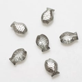 Macro shot of 10x14mm grey transparent fish-shaped crystal glass beads for DIY jewelry - Smoke Gray