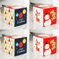 Detail of Christmas gift boxes with Santa and reindeer patterns on wooden floor - HY-6 Style
