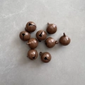 Nine brown 14mm round metal bells with glossy paint finish on a gray textured background - Coffee